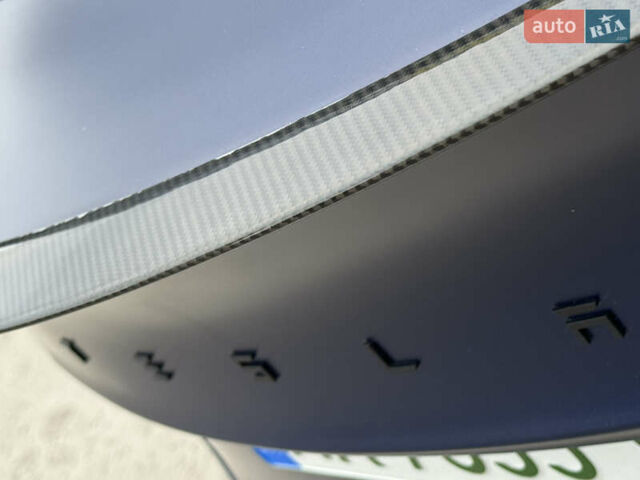 Синий Тесла Model Y, объемом двигателя 0 л и пробегом 88 тыс. км за 31990 $, фото 24 на Automoto.ua