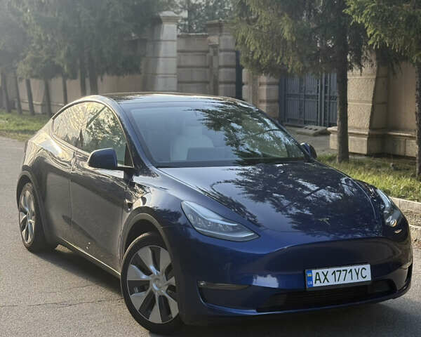 Синий Тесла Model Y, объемом двигателя 0 л и пробегом 97 тыс. км за 26500 $, фото 2 на Automoto.ua