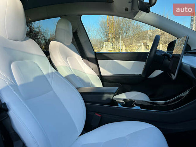 Синій Тесла Model Y, об'ємом двигуна 0 л та пробігом 64 тис. км за 26900 $, фото 15 на Automoto.ua