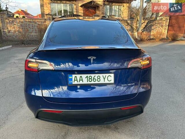Синий Тесла Model Y, объемом двигателя 0 л и пробегом 62 тыс. км за 25800 $, фото 2 на Automoto.ua