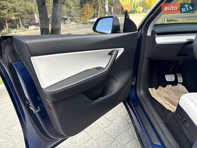 Синий Тесла Model Y, объемом двигателя 0 л и пробегом 86 тыс. км за 25900 $, фото 73 на Automoto.ua