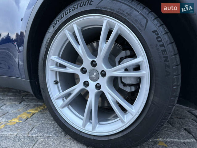 Тесла Model Y 2021 в Харькове на Automoto.ua Синий Тесла Model Y, объемом двигателя 0 л и пробегом 113 тыс. км за 21200 $, фото 79 на Automoto.ua