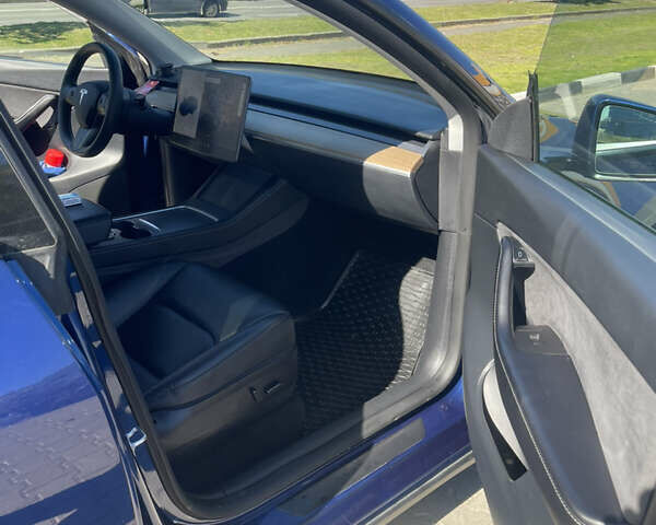 Синий Тесла Model Y, объемом двигателя 0 л и пробегом 127 тыс. км за 24700 $, фото 8 на Automoto.ua