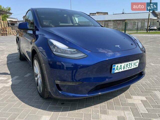 Синий Тесла Model Y, объемом двигателя 0 л и пробегом 61 тыс. км за 26500 $, фото 2 на Automoto.ua