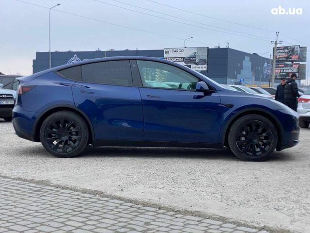 Синій Тесла Model Y, об'ємом двигуна 0 л та пробігом 91 тис. км за 25990 $, фото 2 на Automoto.ua