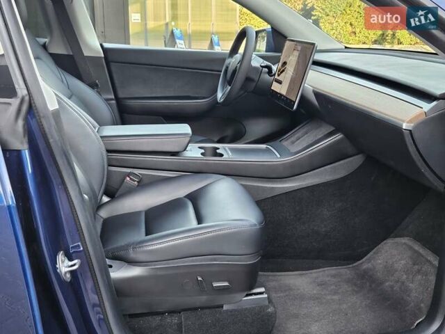 Синий Тесла Model Y, объемом двигателя 0 л и пробегом 99 тыс. км за 26500 $, фото 21 на Automoto.ua