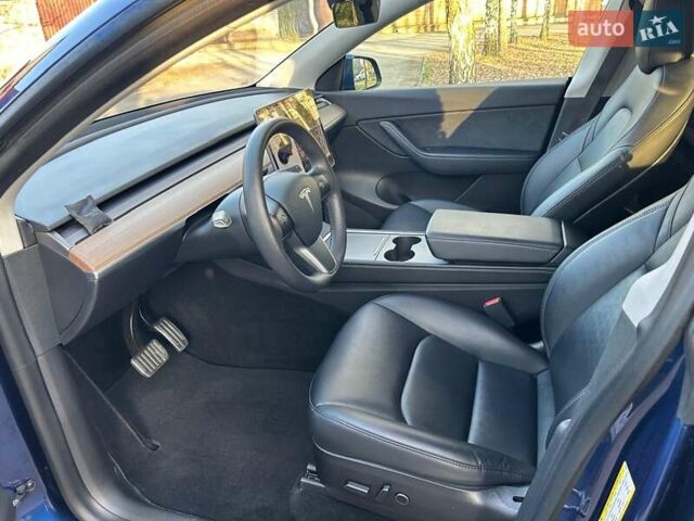 Синий Тесла Model Y, объемом двигателя 0 л и пробегом 62 тыс. км за 25800 $, фото 12 на Automoto.ua