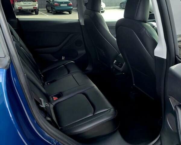 Синий Тесла Model Y, объемом двигателя 0 л и пробегом 28 тыс. км за 29999 $, фото 5 на Automoto.ua