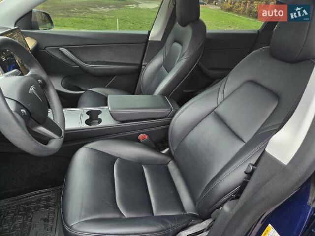 Синий Тесла Model Y, объемом двигателя 0 л и пробегом 99 тыс. км за 25500 $, фото 33 на Automoto.ua