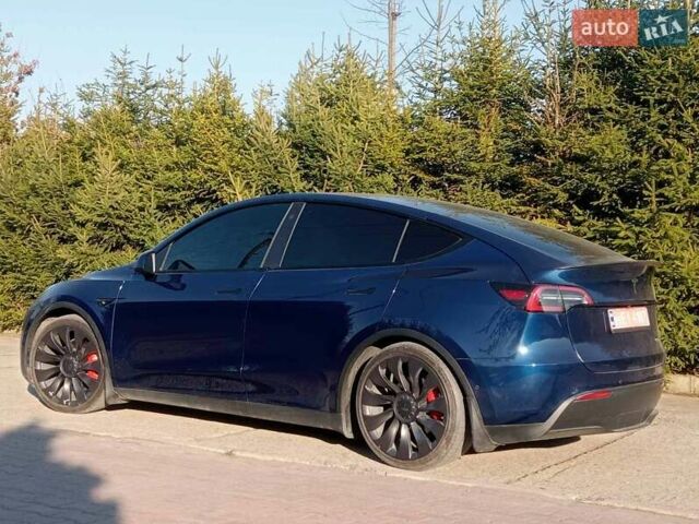 Синий Тесла Model Y, объемом двигателя 0 л и пробегом 115 тыс. км за 21900 $, фото 4 на Automoto.ua