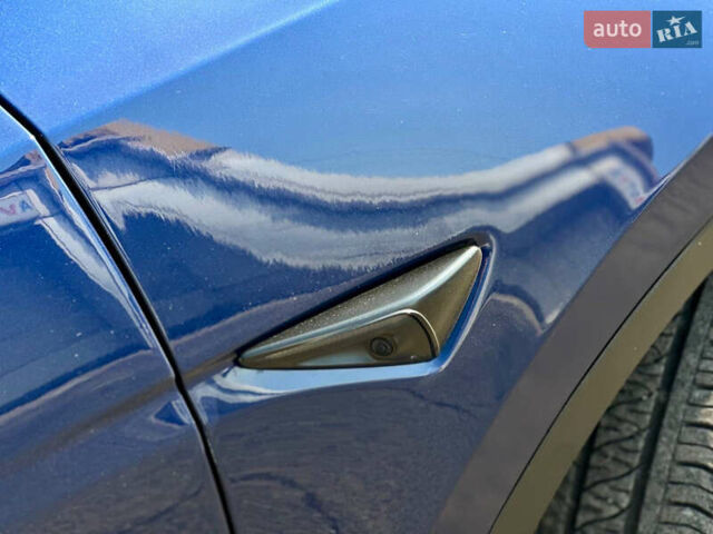Синий Тесла Model Y, объемом двигателя 0 л и пробегом 33 тыс. км за 23900 $, фото 11 на Automoto.ua