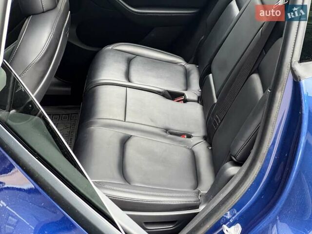 Синий Тесла Model Y, объемом двигателя 0 л и пробегом 66 тыс. км за 25500 $, фото 14 на Automoto.ua
