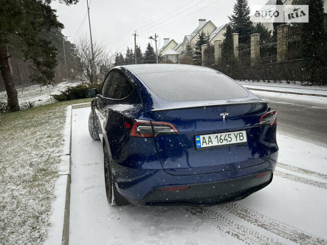 Синий Тесла Model Y, объемом двигателя 0 л и пробегом 66 тыс. км за 25000 $, фото 4 на Automoto.ua