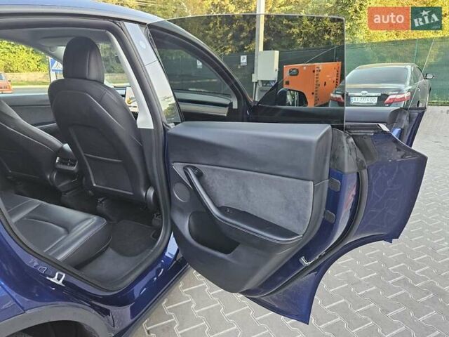 Синий Тесла Model Y, объемом двигателя 0 л и пробегом 99 тыс. км за 26500 $, фото 25 на Automoto.ua