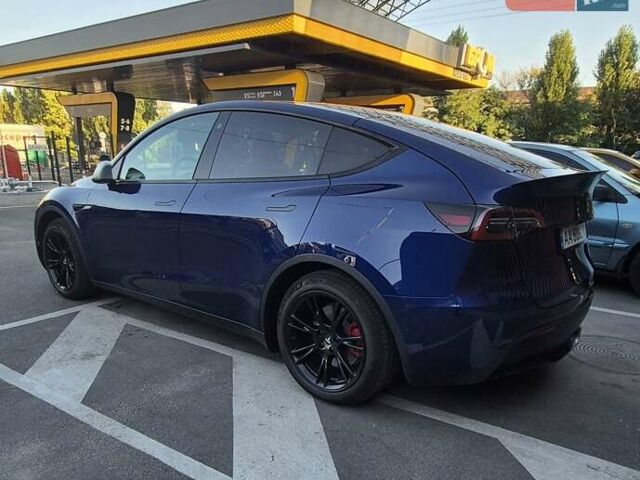 Синий Тесла Model Y, объемом двигателя 0 л и пробегом 69 тыс. км за 26500 $, фото 1 на Automoto.ua