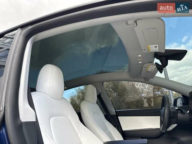 Синий Тесла Model Y, объемом двигателя 0 л и пробегом 87 тыс. км за 23900 $, фото 51 на Automoto.ua