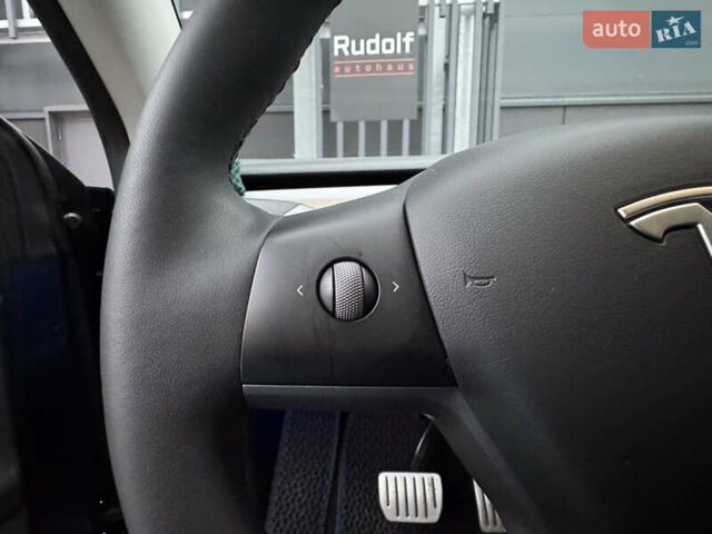 Синий Тесла Model Y, объемом двигателя 0 л и пробегом 88 тыс. км за 31990 $, фото 43 на Automoto.ua