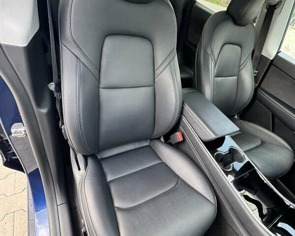Синий Тесла Model Y, объемом двигателя 0 л и пробегом 83 тыс. км за 24999 $, фото 19 на Automoto.ua