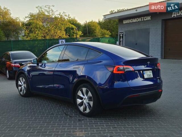 Синий Тесла Model Y, объемом двигателя 0 л и пробегом 99 тыс. км за 26500 $, фото 5 на Automoto.ua