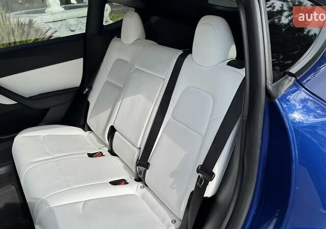 Синій Тесла Model Y, об'ємом двигуна 0 л та пробігом 66 тис. км за 28351 $, фото 20 на Automoto.ua