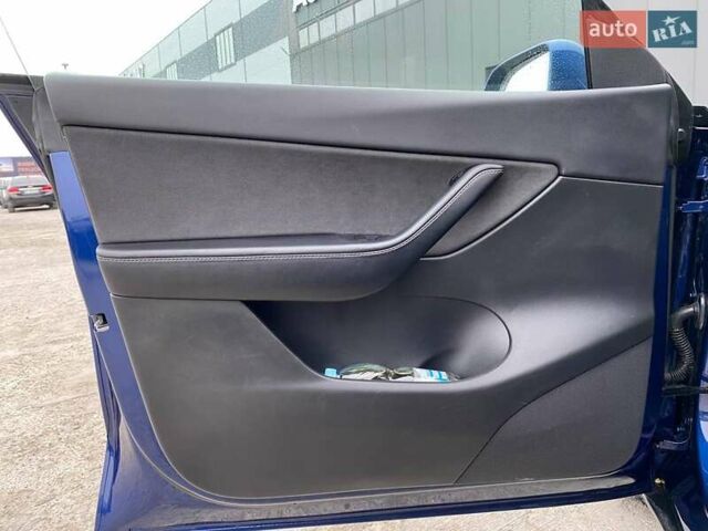 Синій Тесла Model Y, об'ємом двигуна 0 л та пробігом 91 тис. км за 25990 $, фото 7 на Automoto.ua