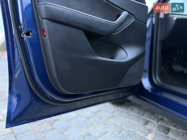 Тесла Model Y 2021 в Харькове на Automoto.ua Синий Тесла Model Y, объемом двигателя 0 л и пробегом 113 тыс. км за 21200 $, фото 38 на Automoto.ua