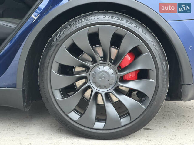 Синий Тесла Model Y, объемом двигателя 0 л и пробегом 88 тыс. км за 31990 $, фото 31 на Automoto.ua
