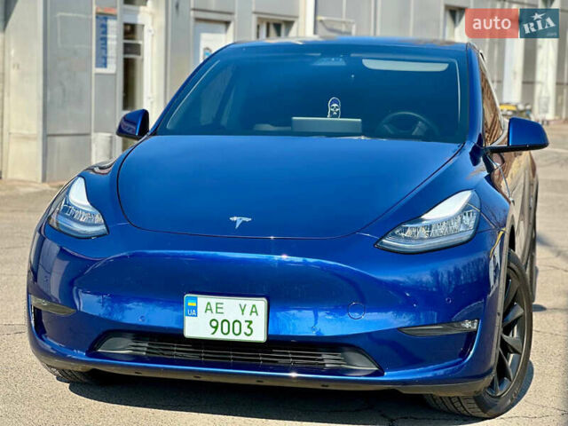 Синий Тесла Model Y, объемом двигателя 0 л и пробегом 33 тыс. км за 23300 $, фото 1 на Automoto.ua