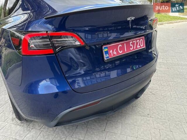 Синій Тесла Model Y, об'ємом двигуна 0 л та пробігом 88 тис. км за 22999 $, фото 31 на Automoto.ua