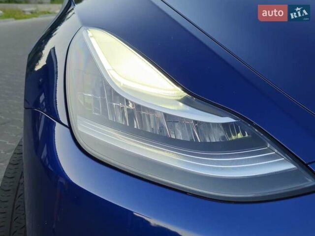 Синий Тесла Model Y, объемом двигателя 0 л и пробегом 99 тыс. км за 26500 $, фото 34 на Automoto.ua