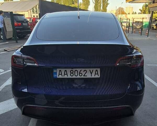 Синий Тесла Model Y, объемом двигателя 0 л и пробегом 69 тыс. км за 26500 $, фото 2 на Automoto.ua