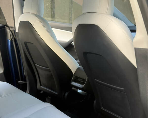 Синий Тесла Model Y, объемом двигателя 0 л и пробегом 97 тыс. км за 26500 $, фото 21 на Automoto.ua