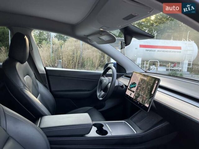 Синий Тесла Model Y, объемом двигателя 0 л и пробегом 68 тыс. км за 25000 $, фото 17 на Automoto.ua