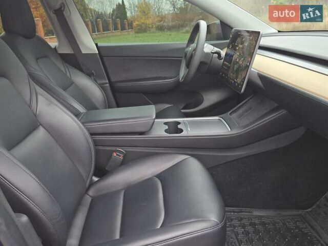 Синий Тесла Model Y, объемом двигателя 0 л и пробегом 99 тыс. км за 25500 $, фото 31 на Automoto.ua