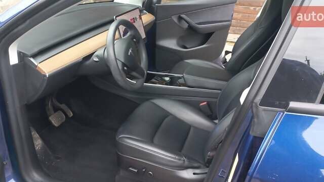 Синий Тесла Model Y, объемом двигателя 0 л и пробегом 74 тыс. км за 26500 $, фото 6 на Automoto.ua