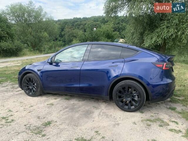 Синий Тесла Model Y, объемом двигателя 0 л и пробегом 75 тыс. км за 22900 $, фото 4 на Automoto.ua