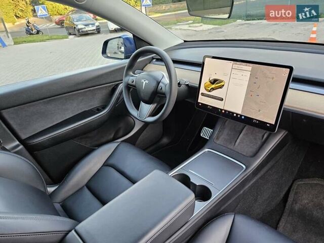 Синий Тесла Model Y, объемом двигателя 0 л и пробегом 99 тыс. км за 26500 $, фото 20 на Automoto.ua