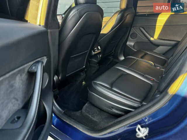 Синий Тесла Model Y, объемом двигателя 0 л и пробегом 83 тыс. км за 26999 $, фото 47 на Automoto.ua