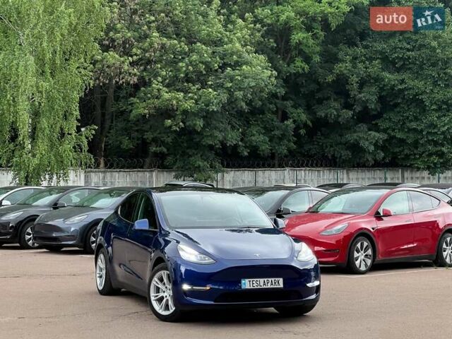 Синий Тесла Model Y, объемом двигателя 0 л и пробегом 66 тыс. км за 25500 $, фото 1 на Automoto.ua