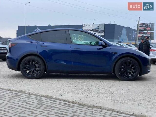 Синій Тесла Model Y, об'ємом двигуна 0 л та пробігом 91 тис. км за 25990 $, фото 2 на Automoto.ua