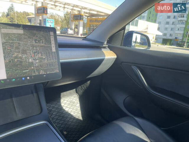 Синий Тесла Model Y, объемом двигателя 0 л и пробегом 127 тыс. км за 24700 $, фото 12 на Automoto.ua