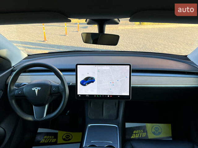 Синий Тесла Model Y, объемом двигателя 0 л и пробегом 72 тыс. км за 25750 $, фото 14 на Automoto.ua