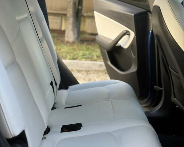 Синий Тесла Model Y, объемом двигателя 0 л и пробегом 97 тыс. км за 26500 $, фото 22 на Automoto.ua