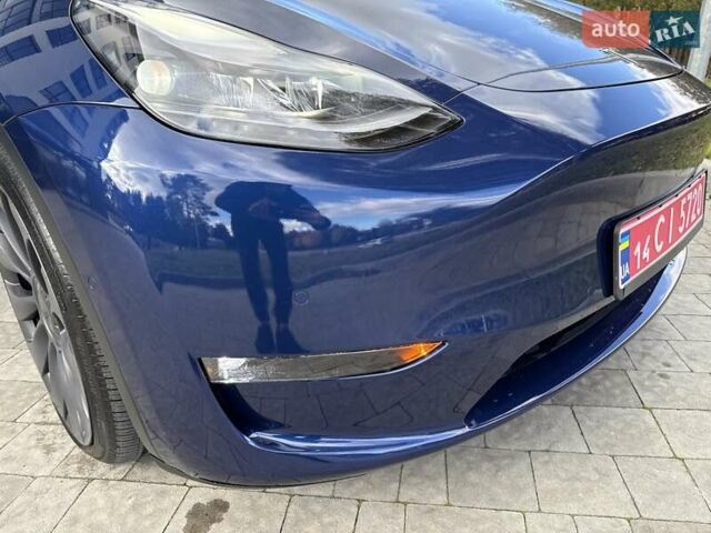 Синий Тесла Model Y, объемом двигателя 0 л и пробегом 86 тыс. км за 25900 $, фото 34 на Automoto.ua