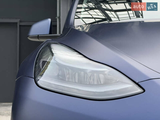 Синий Тесла Model Y, объемом двигателя 0 л и пробегом 88 тыс. км за 31990 $, фото 10 на Automoto.ua