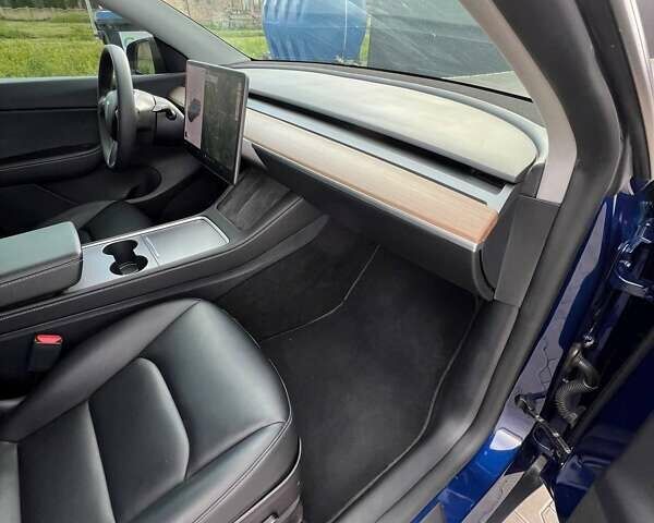 Синий Тесла Model Y, объемом двигателя 0 л и пробегом 45 тыс. км за 34750 $, фото 17 на Automoto.ua