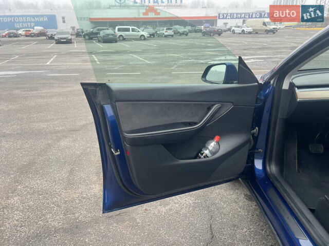 Синий Тесла Model Y, объемом двигателя 0 л и пробегом 125 тыс. км за 25997 $, фото 15 на Automoto.ua