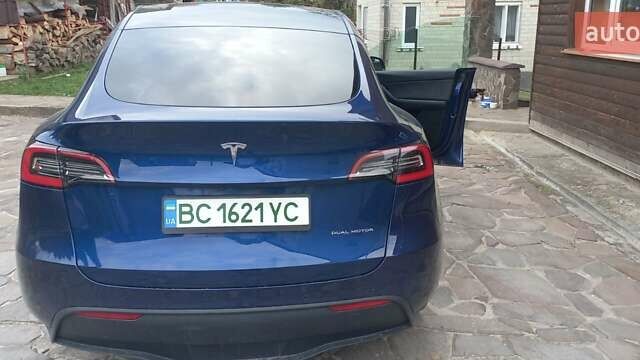 Синий Тесла Model Y, объемом двигателя 0 л и пробегом 74 тыс. км за 26500 $, фото 12 на Automoto.ua