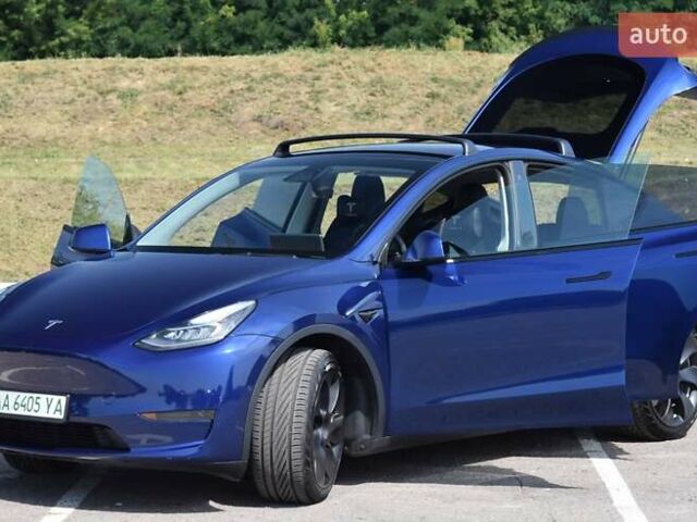 Синий Тесла Model Y, объемом двигателя 0 л и пробегом 81 тыс. км за 25499 $, фото 12 на Automoto.ua