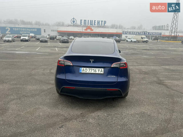 Синий Тесла Model Y, объемом двигателя 0 л и пробегом 125 тыс. км за 25997 $, фото 22 на Automoto.ua